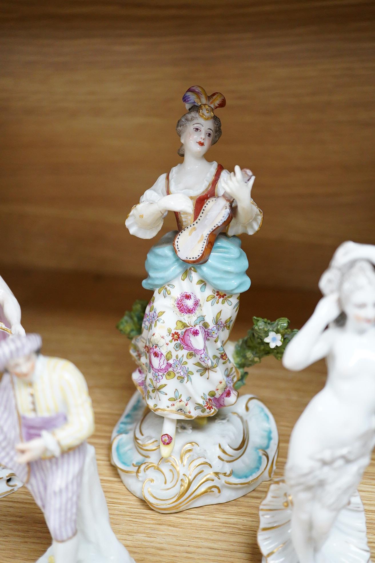 A Meissen seated figure emblematic of sense of smell, and three pairs of Continental porcelain figures, (7) tallest 19cm.